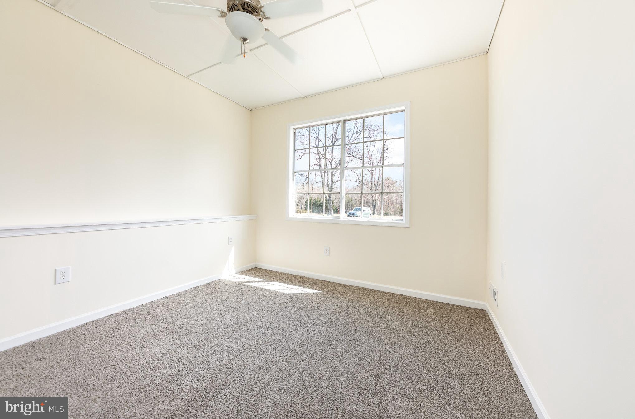 8430 Courthouse Road Spotsylvania, VA 22551 - Photo 9 of 23 a view of an empty room with a window