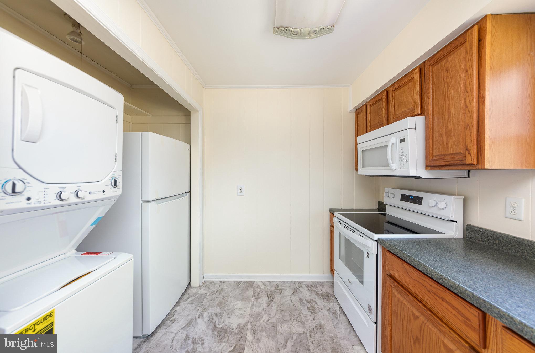 8430 Courthouse Road Spotsylvania, VA 22551 - Photo 10 of 23 a kitchen with a sink a stove and cabinets