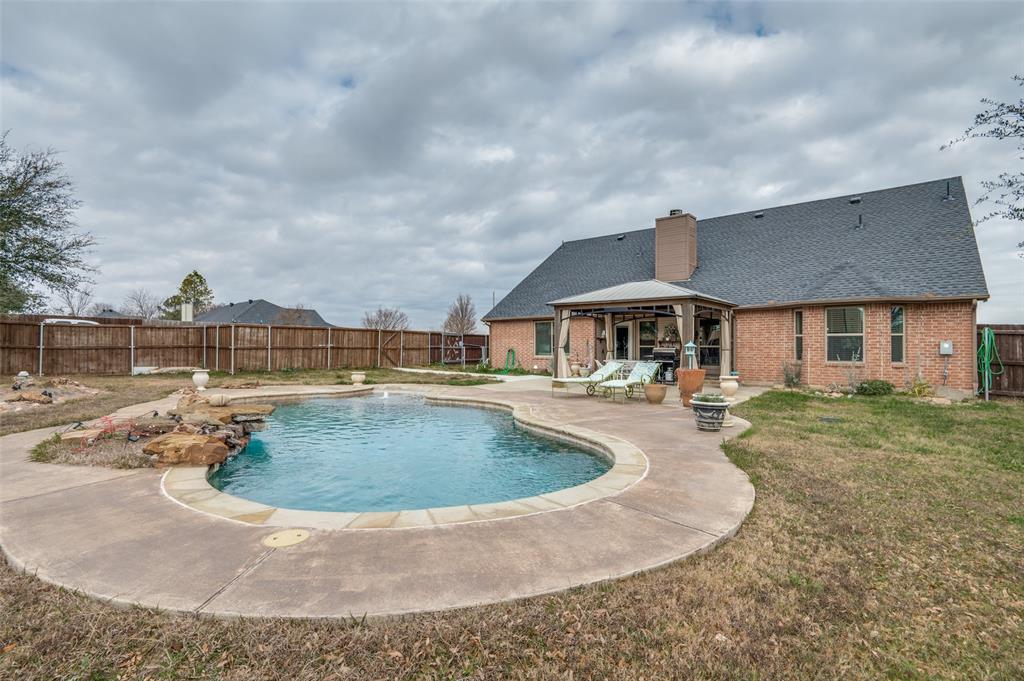 140 Hollis Road Waxahachie, TX 75167 - Photo 24 of 40 a view of outdoor space yard and swimming pool