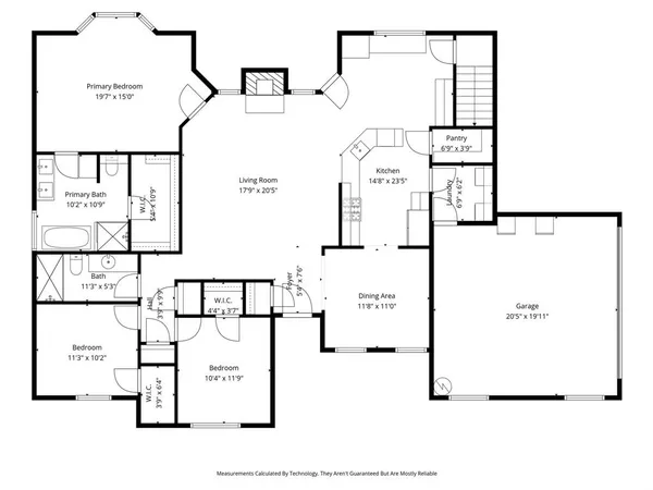 a picture of a room with a white bed and a white refrigerator