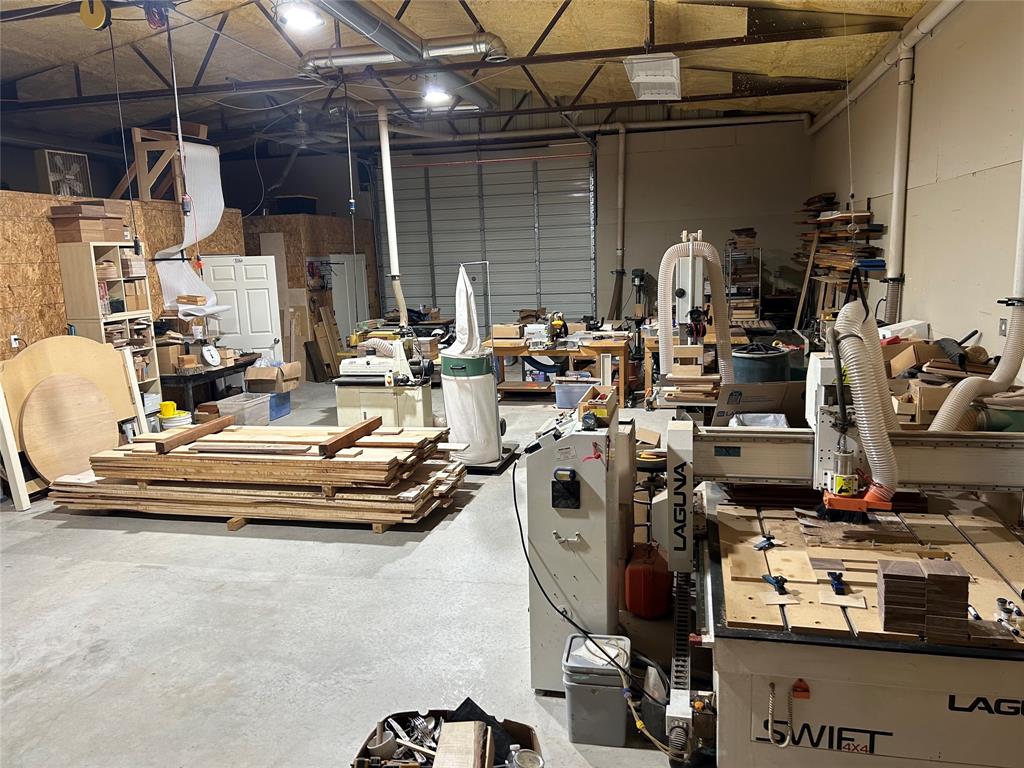 140 Hollis Road Waxahachie, TX 75167 - Photo 33 of 40 a view of a room with gym equipment