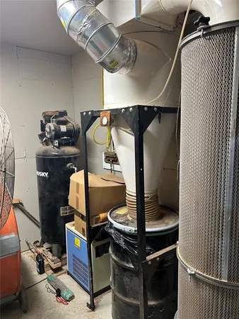 a kitchen with a sink and a stove top oven