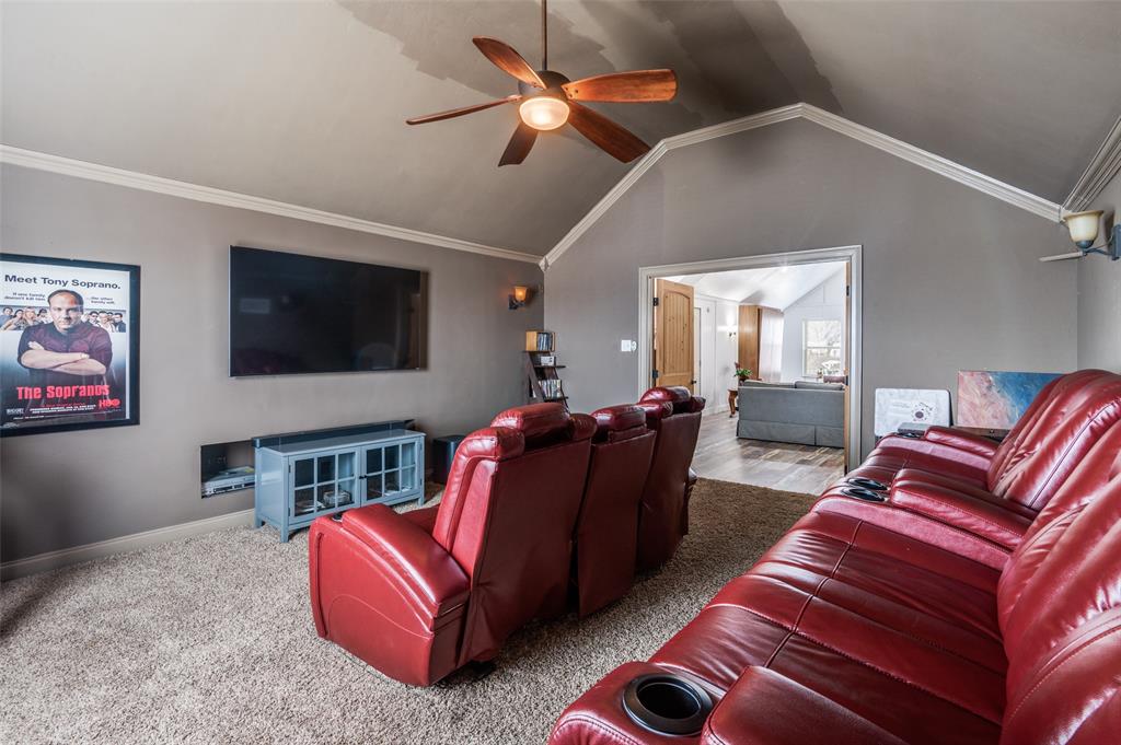 140 Hollis Road Waxahachie, TX 75167 - Photo 9 of 40 a living room with furniture and a flat screen tv