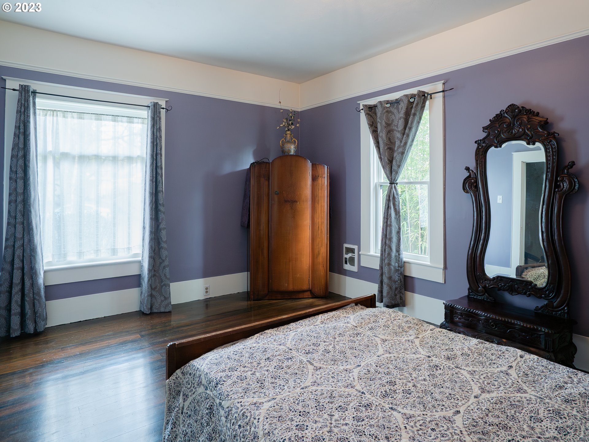 724 D Street Springfield, OR 97477 - Photo 18 of 36 a bedroom with a bed and a large mirror