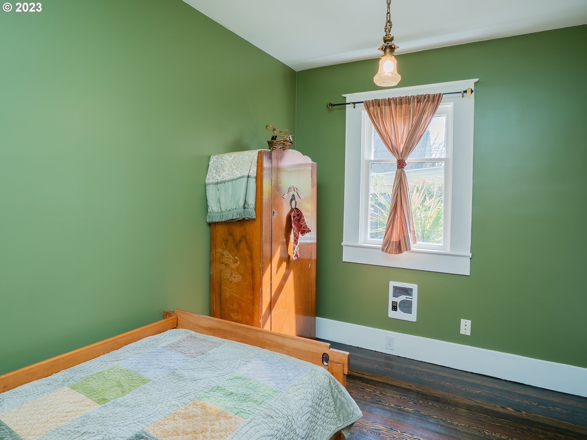 724 D Street Springfield, OR 97477 - Photo 21 of 36 a bedroom with a bed and a window
