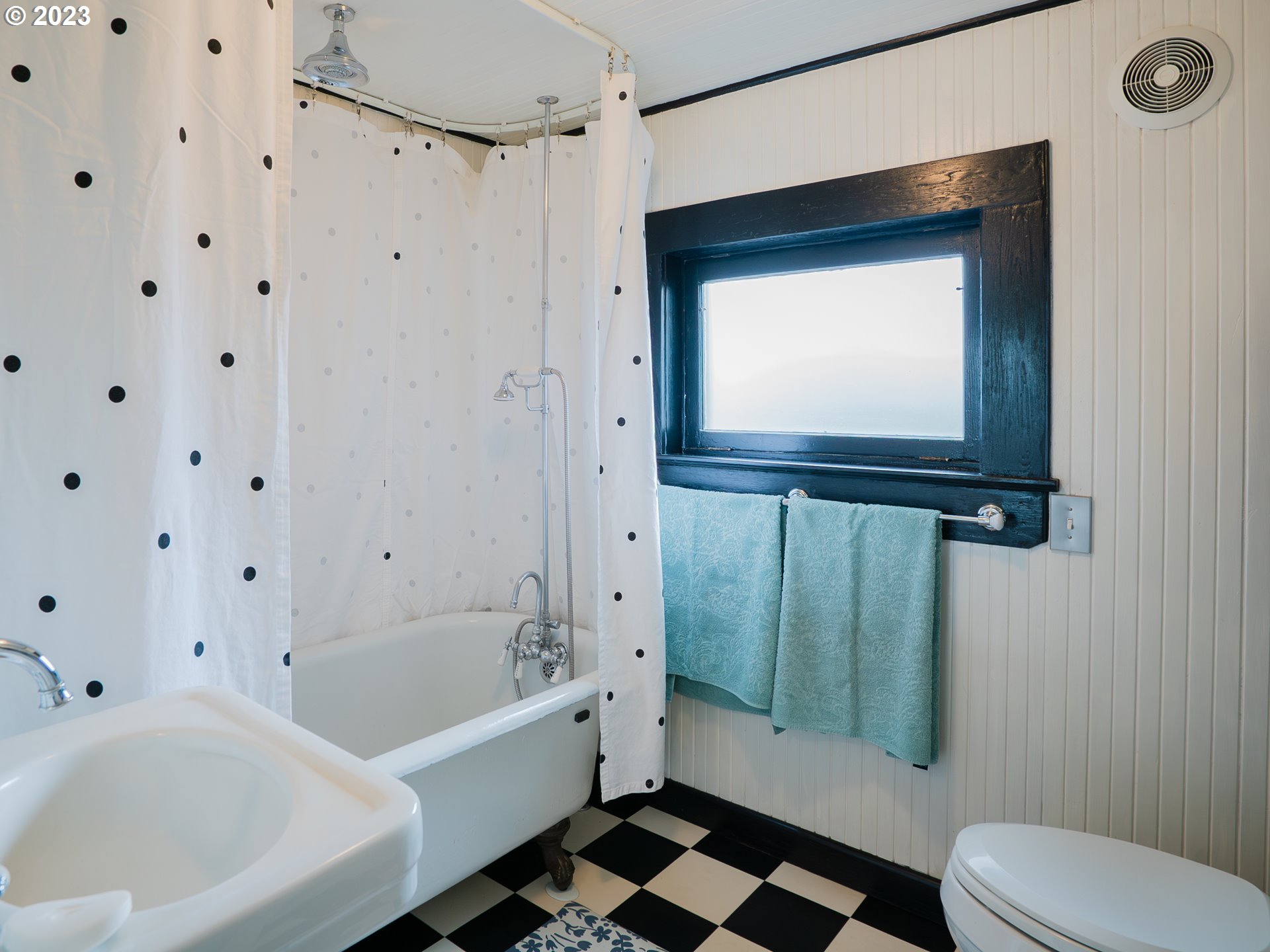 724 D Street Springfield, OR 97477 - Photo 22 of 36 a bathroom with a sink a toilet and shower
