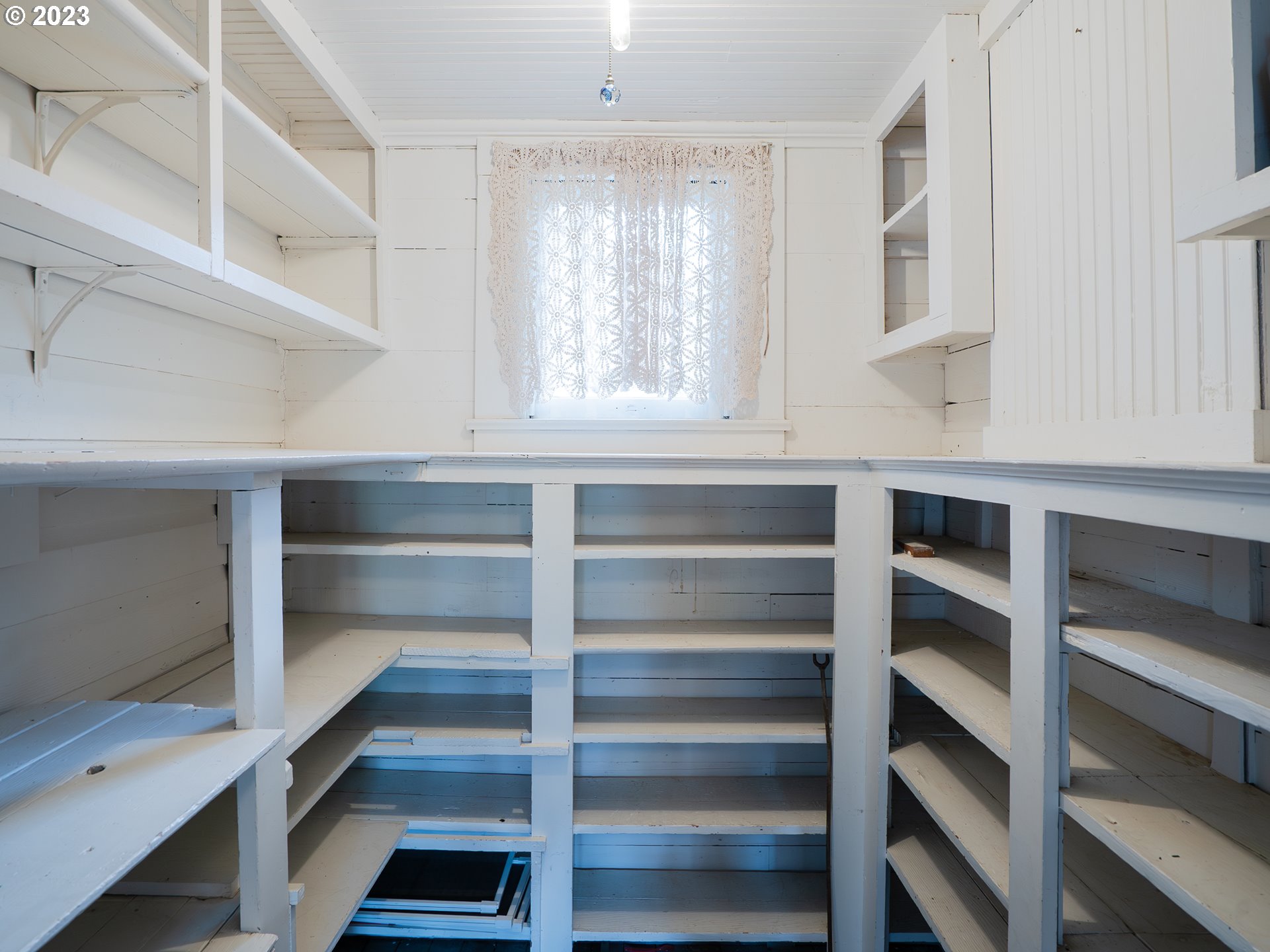 724 D Street Springfield, OR 97477 - Photo 25 of 36 a view of walk in closet with empty racks