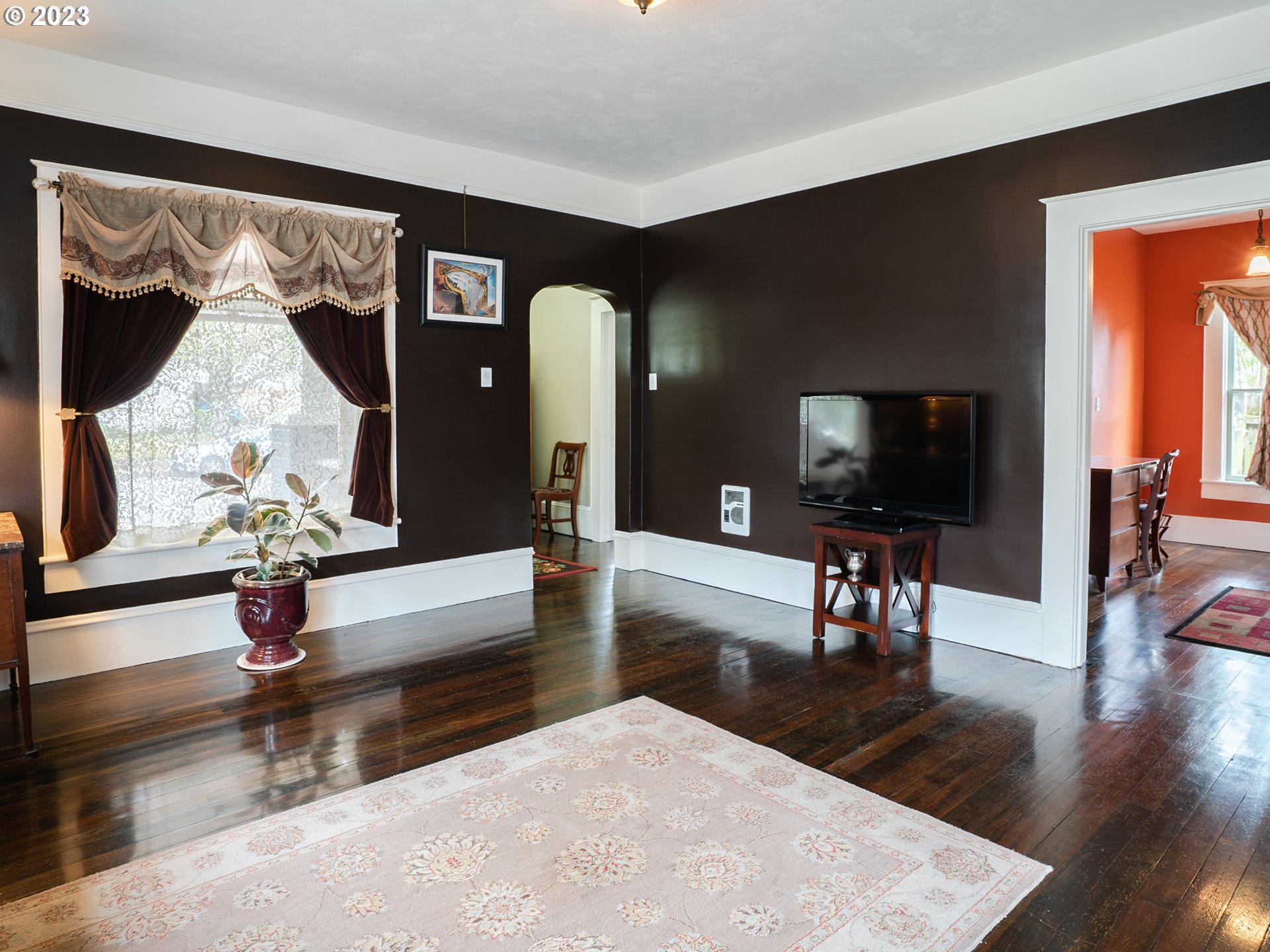724 D Street Springfield, OR 97477 - Photo 8 of 36 a living room with furniture and a flat screen tv