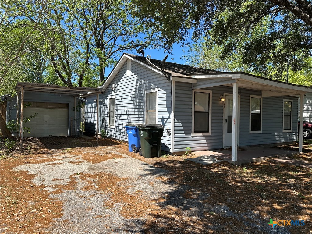 908 Pecan Street Seguin, TX 78155 - Photo 2 of 11 a view of a house with a yard
