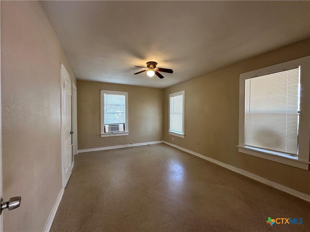 908 Pecan Street Seguin, TX 78155 - Photo 7 of 11 a view of livingroom with window