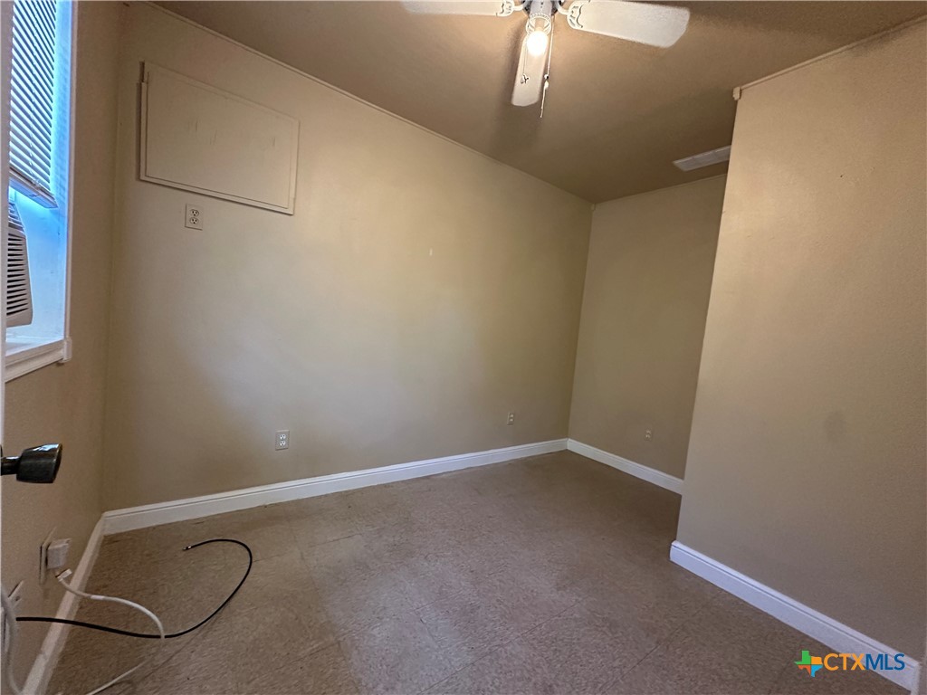 908 Pecan Street Seguin, TX 78155 - Photo 10 of 11 a view of room with window