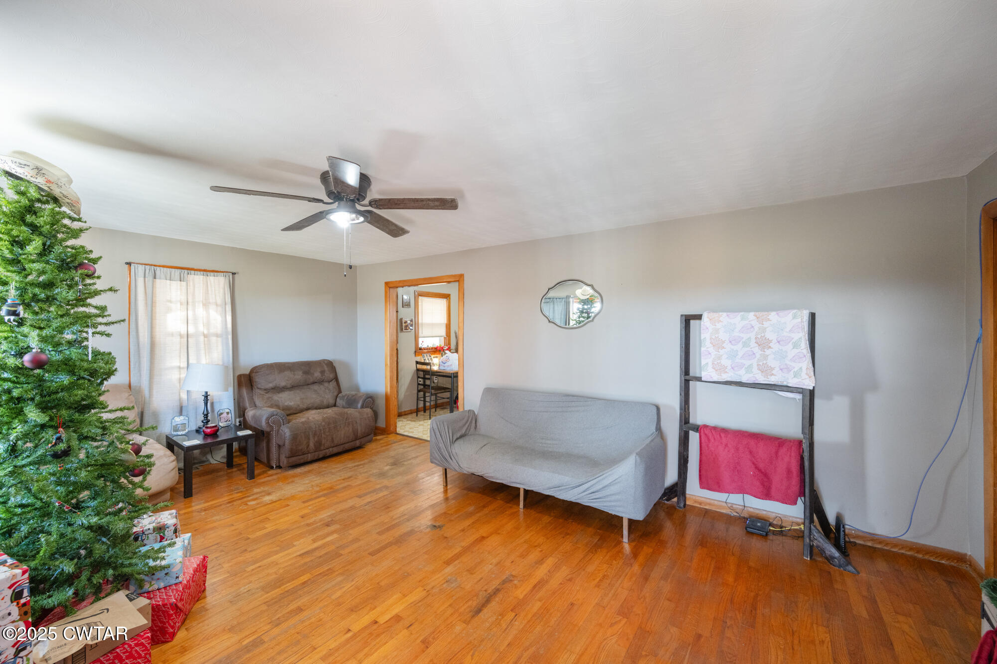 2095 Bible Hill Road Parsons, TN 38363 - Photo 11 of 20 a living room with furniture and a window