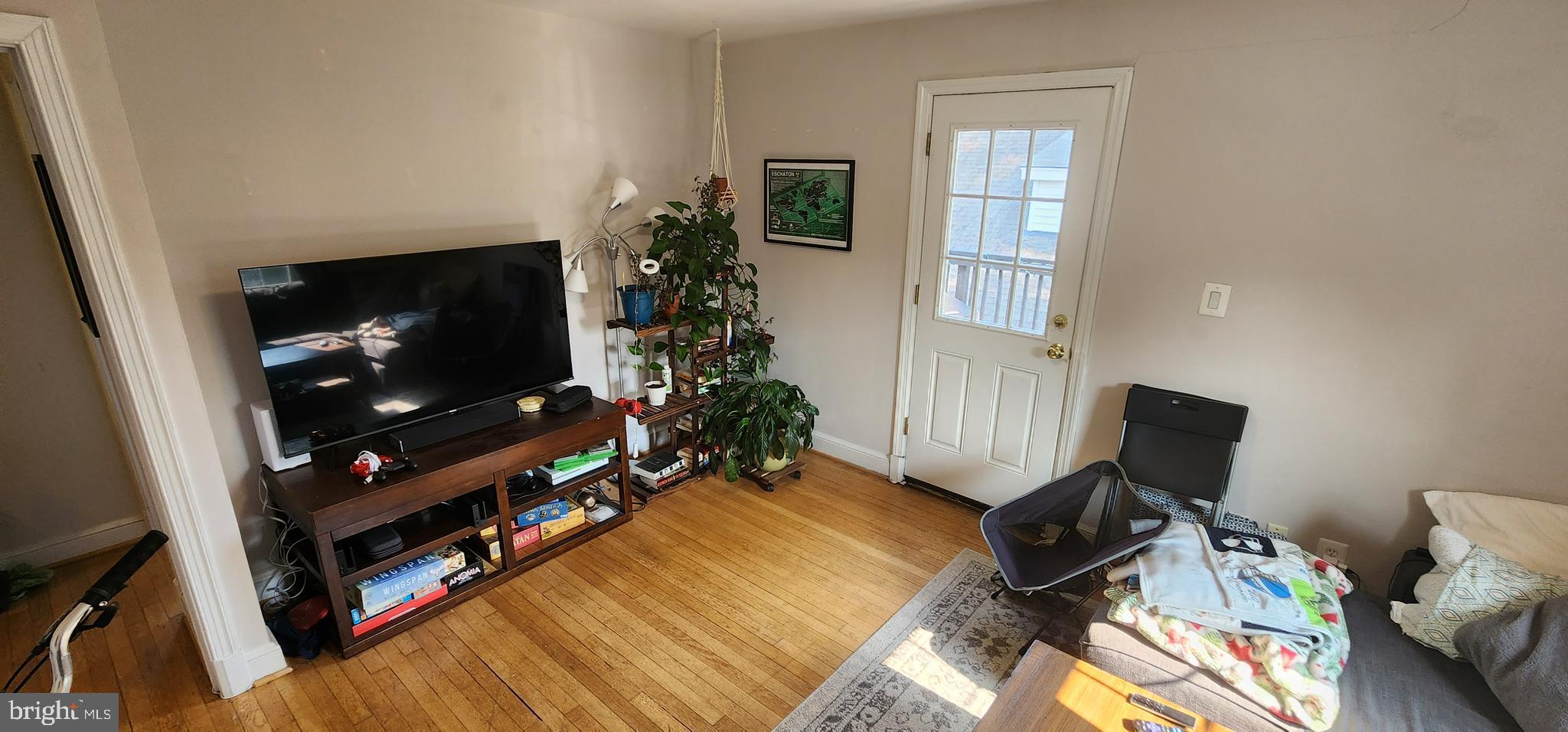 1227 North Utah Street, Unit 3 Arlington, VA 22201 - Photo 11 of 24 a living room with furniture and a flat screen tv