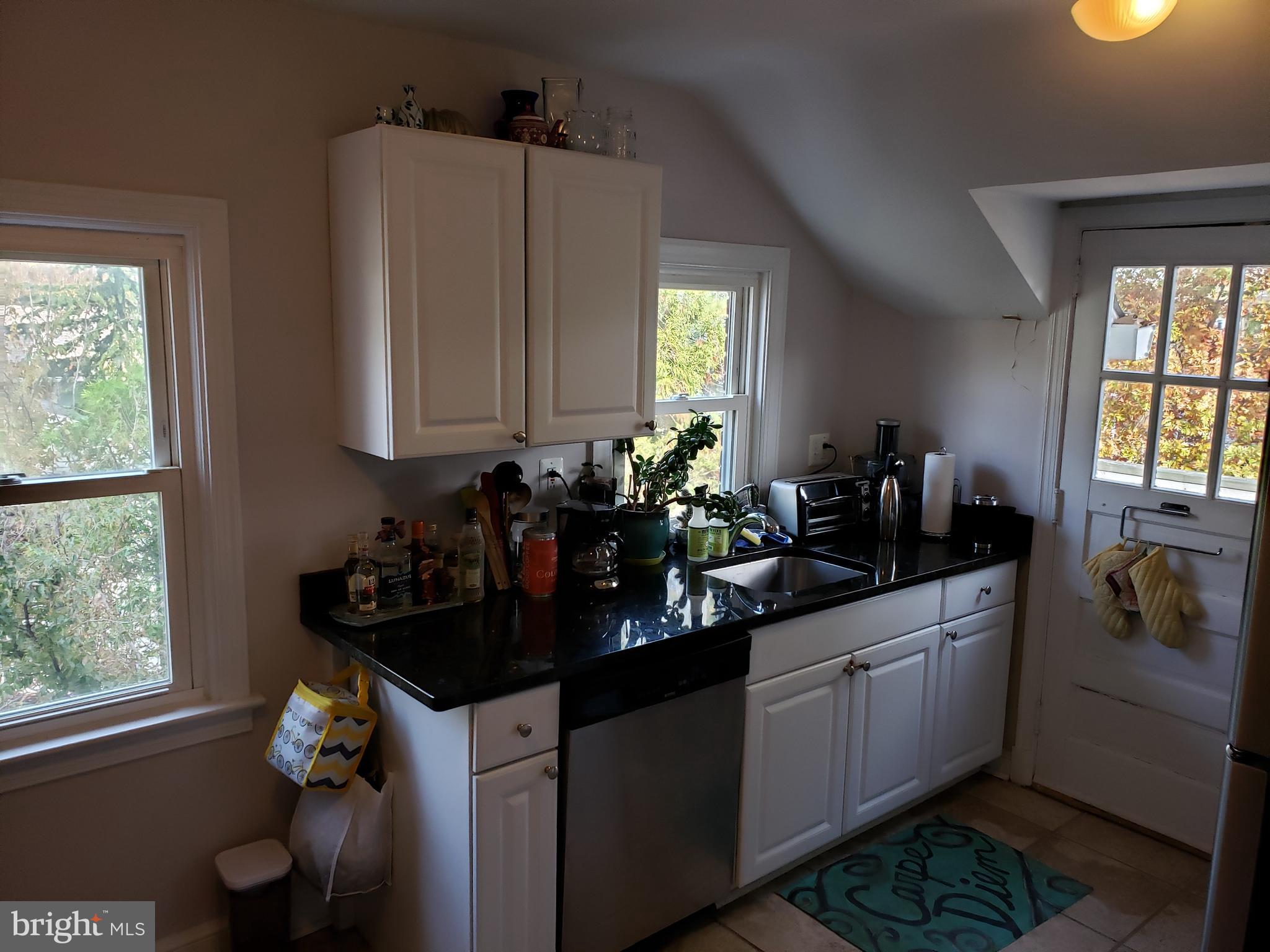 1227 North Utah Street, Unit 3 Arlington, VA 22201 - Photo 13 of 26 a kitchen with sink and window