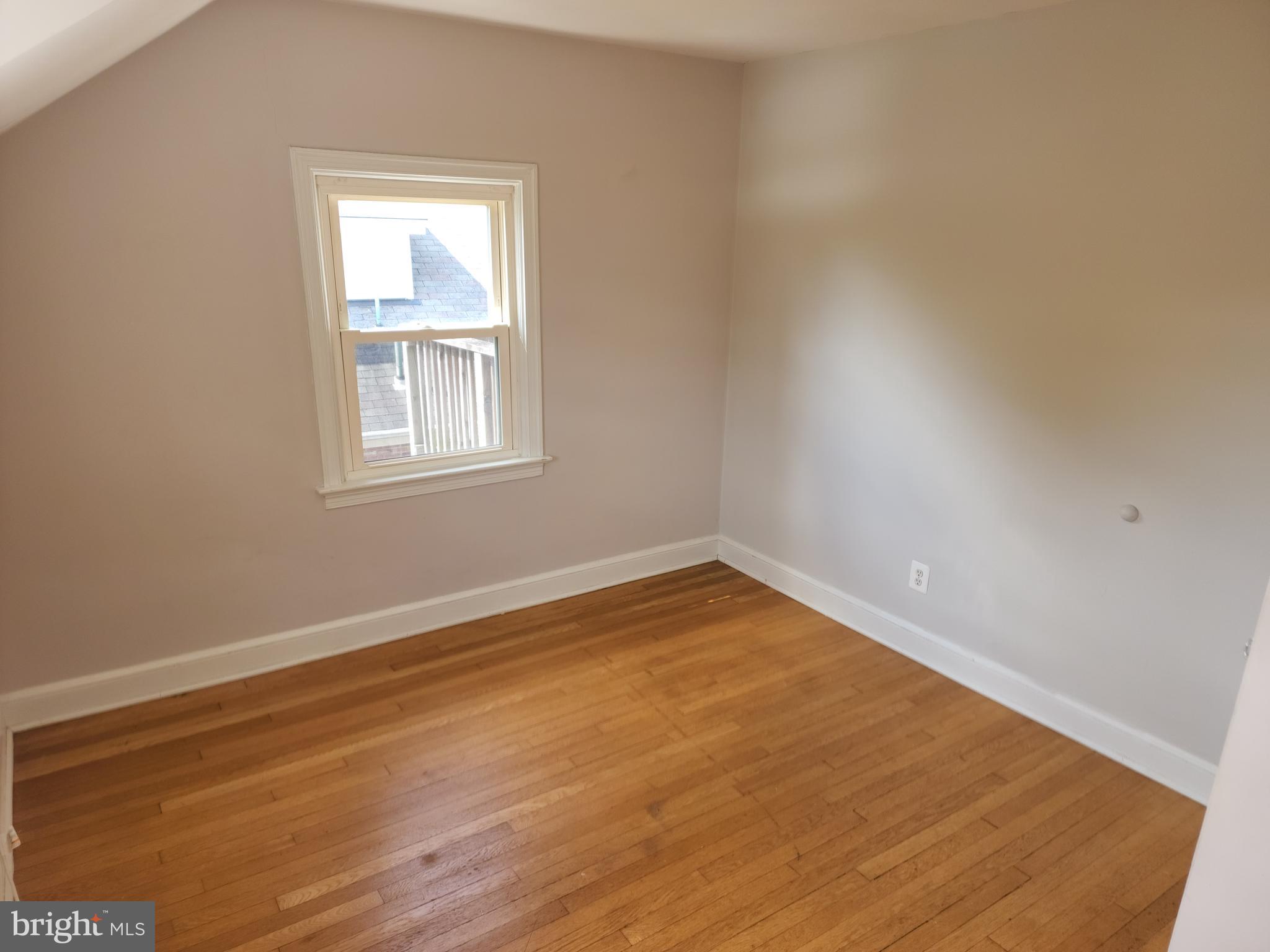 1227 North Utah Street, Unit 3 Arlington, VA 22201 - Photo 14 of 26 an empty room with a window