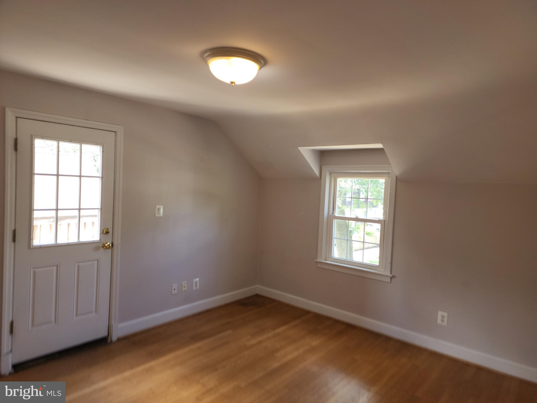 1227 North Utah Street, Unit 3 Arlington, VA 22201 - Photo 17 of 24 an empty room with windows