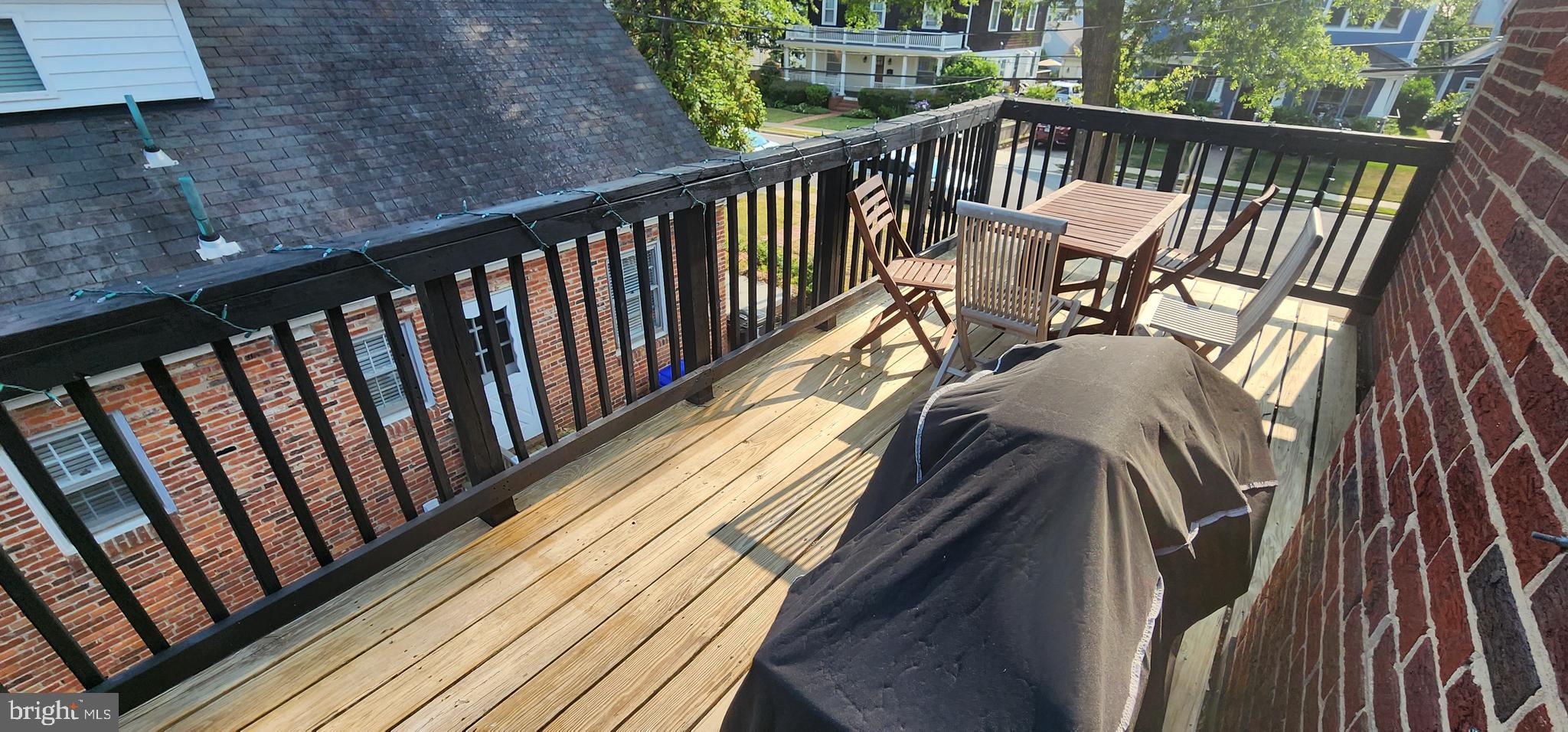 1227 North Utah Street, Unit 3 Arlington, VA 22201 - Photo 23 of 26 a view of balcony with wooden floor