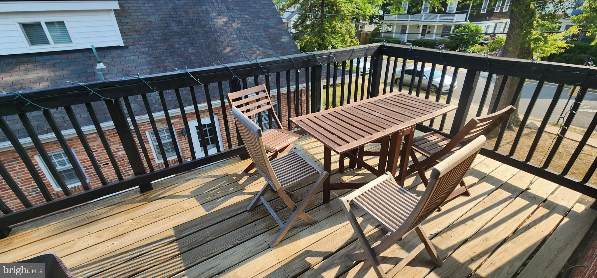 1227 North Utah Street, Unit 3 Arlington, VA 22201 - Photo 24 of 26 a view of a balcony with wooden floor