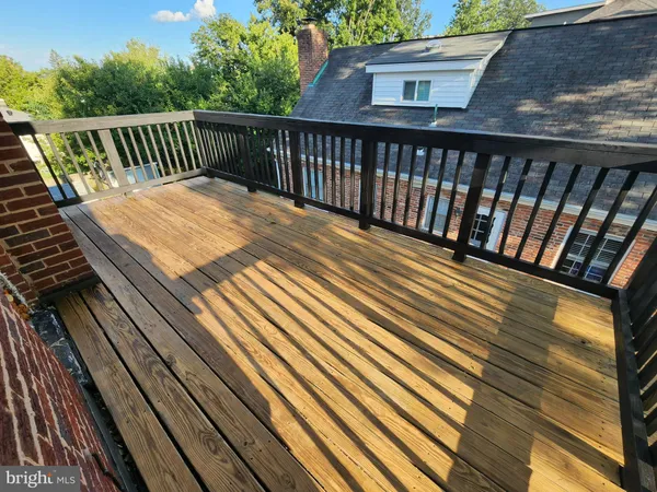 a view from deck having patio