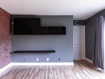 a view of room with a flat screen tv