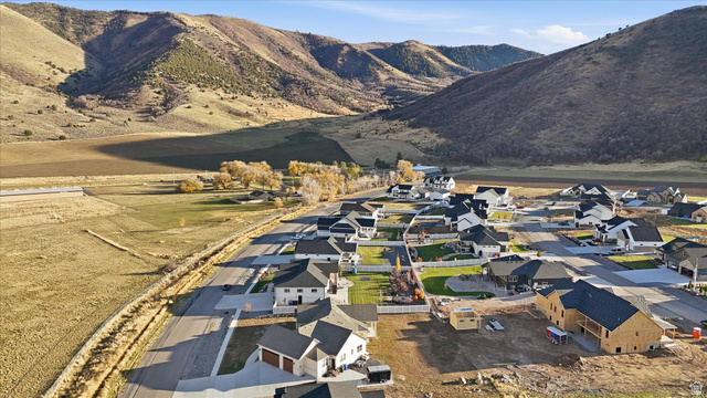 534 East Fish Hatchery Road Mantua, UT 84324 - Photo 80 of 87 Aerial overview of property's location featuring mountains and nearby suburban area