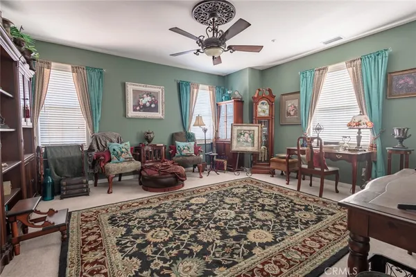 a living room with furniture or couch and a window