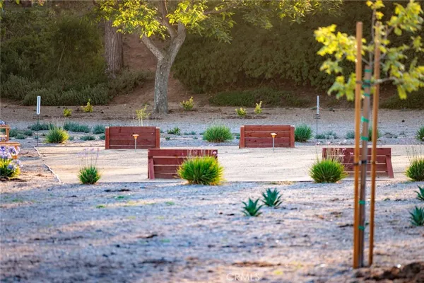 an aerial view of a house with garden space