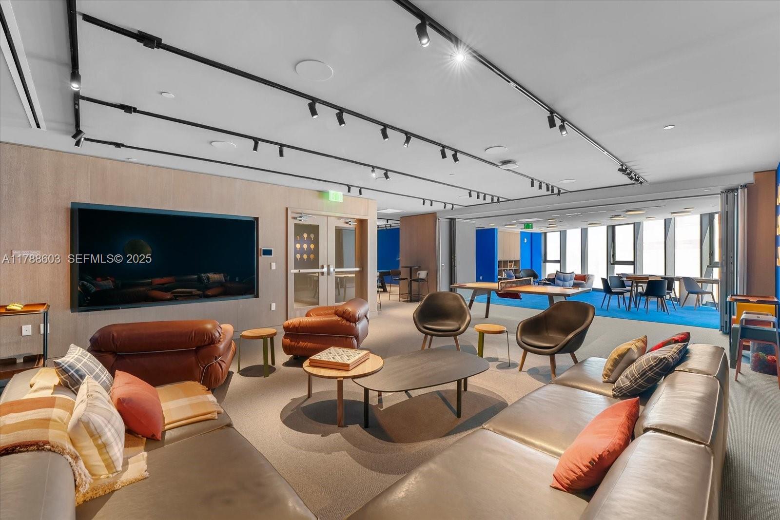 500 Alton Road, Unit 1105 Miami Beach, FL 33139 - Photo 43 of 69 a living room with furniture and a fireplace