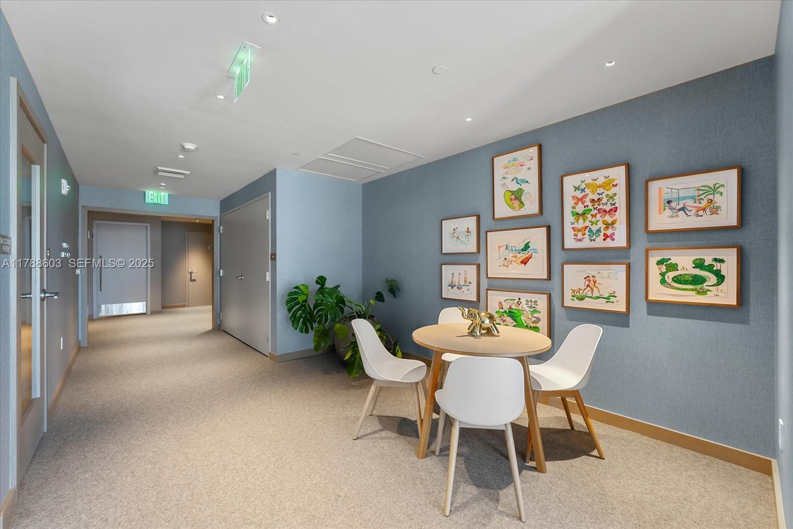 500 Alton Road, Unit 1105 Miami Beach, FL 33139 - Photo 45 of 69 a view of a dining room with furniture and a potted plant