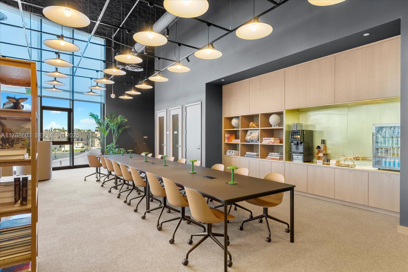 500 Alton Road, Unit 1105 Miami Beach, FL 33139 - Photo 50 of 69 a view of a dining room and livingroom with furniture wooden floor and chandelier