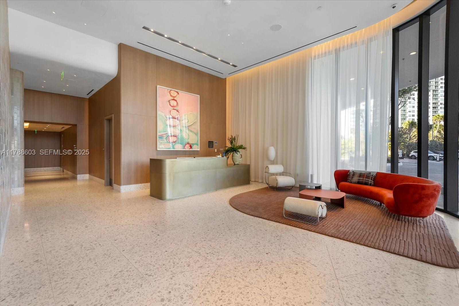 500 Alton Road, Unit 1105 Miami Beach, FL 33139 - Photo 53 of 69 a living room with furniture and large windows