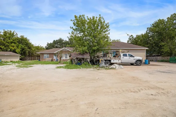 a car parked in front of a house