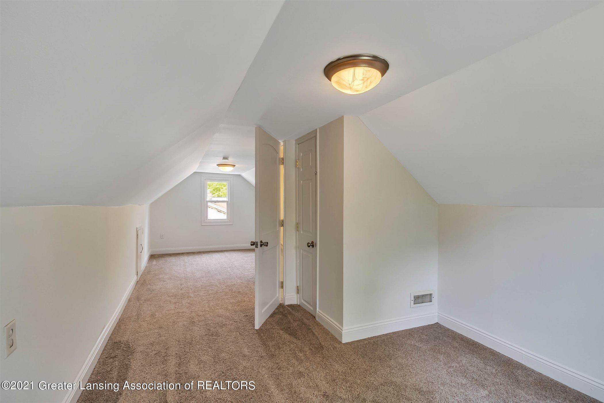1712 West Miller Road Lansing, MI 48911 - Photo 20 of 26 20-1712 W Miller Rd-WindowStill-Real-Est