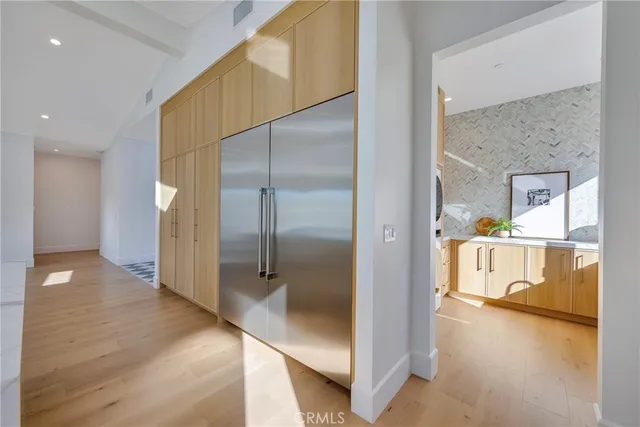 a utility room with sink dryer and washer
