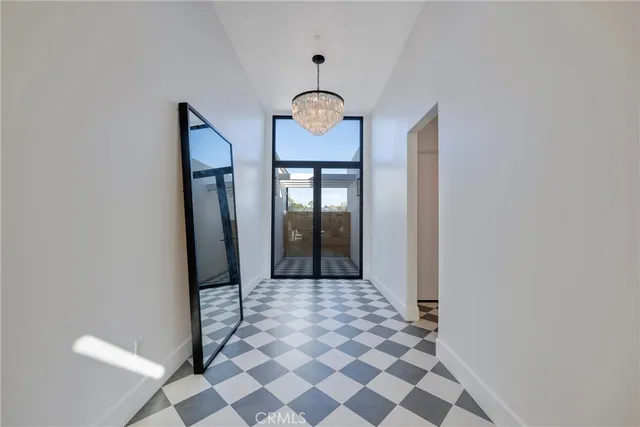 a view of a dinning table and chairs in the patio
