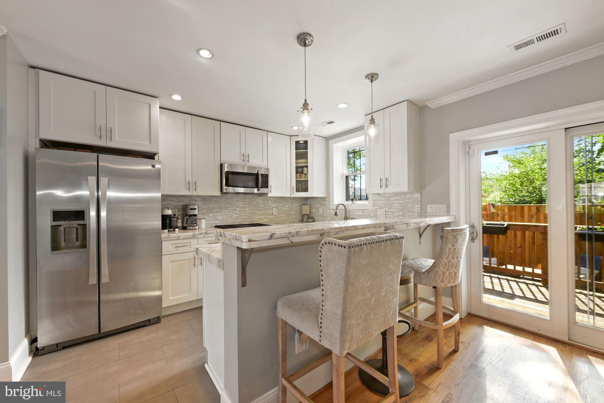624 19th Street Northeast Washington, DC 20002 - Photo 8 of 32 Kitchen bar and extra counter space!