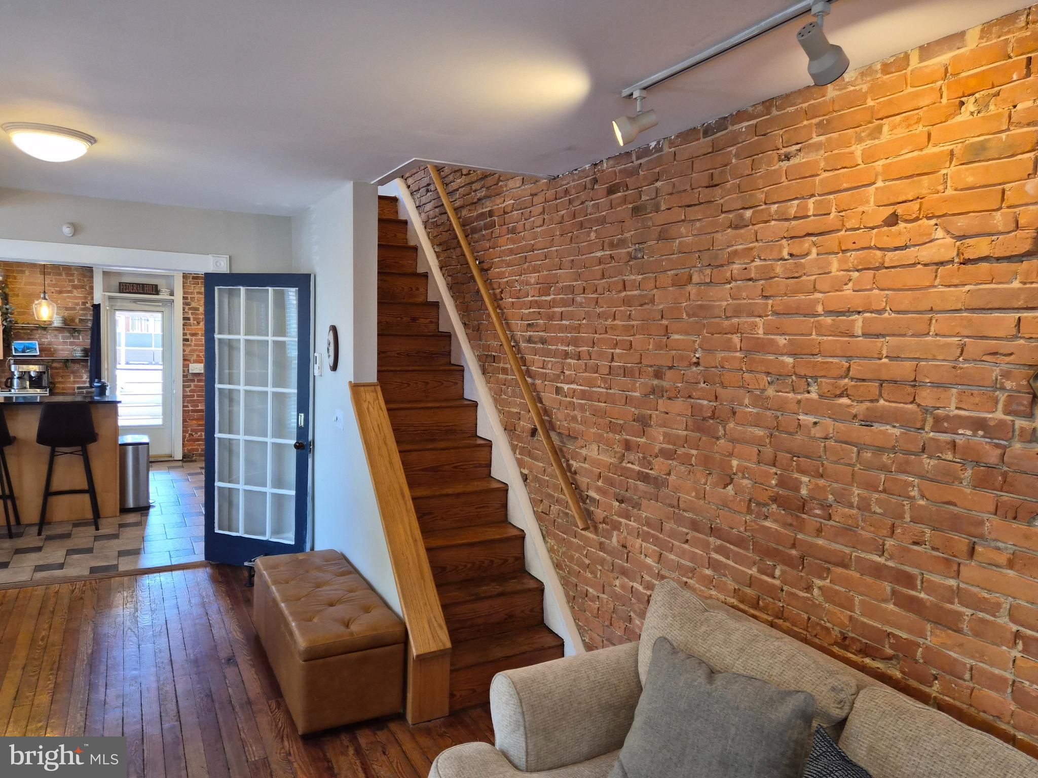 1601 Belt Street Baltimore, MD 21230 - Photo 5 of 30 a view of livingroom with furniture and wooden floor