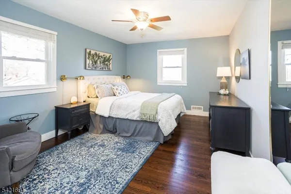 a bed room with a bed and a couch