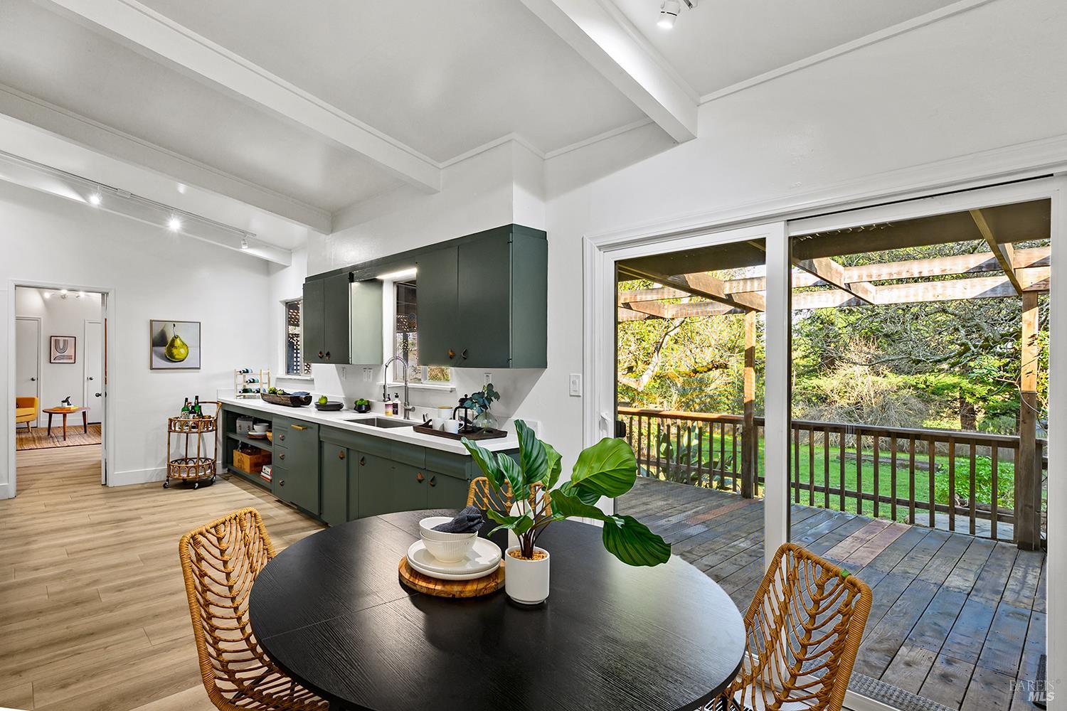 1417 Deer Lane Sebastopol, CA 95472 - Photo 11 of 66 a view of a dining room with furniture window and wooden floor