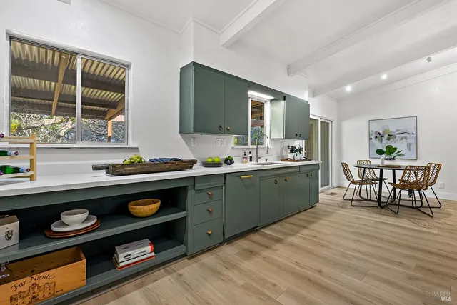 a living room with furniture and a table