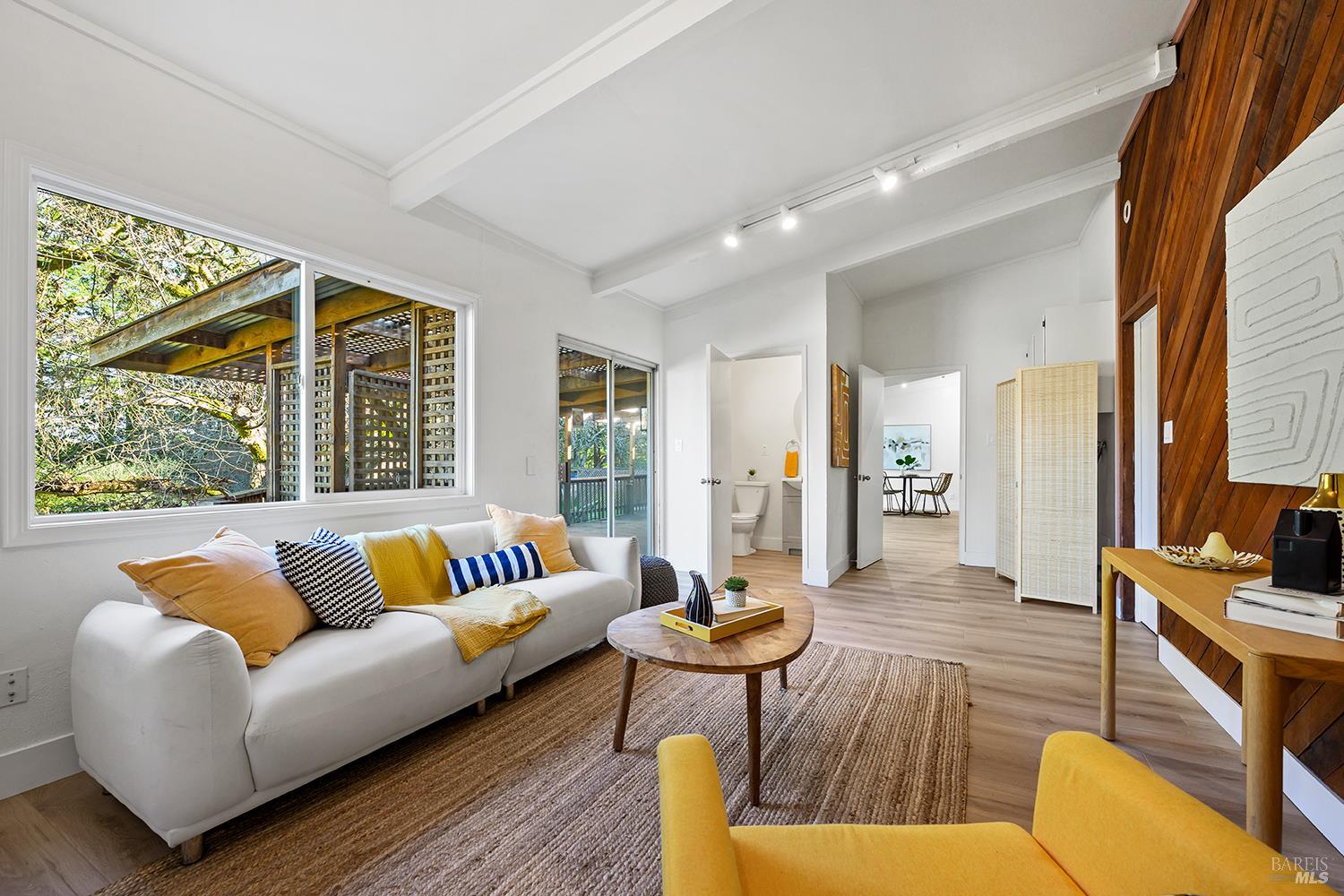 1417 Deer Lane Sebastopol, CA 95472 - Photo 18 of 66 a living room with furniture and a large window
