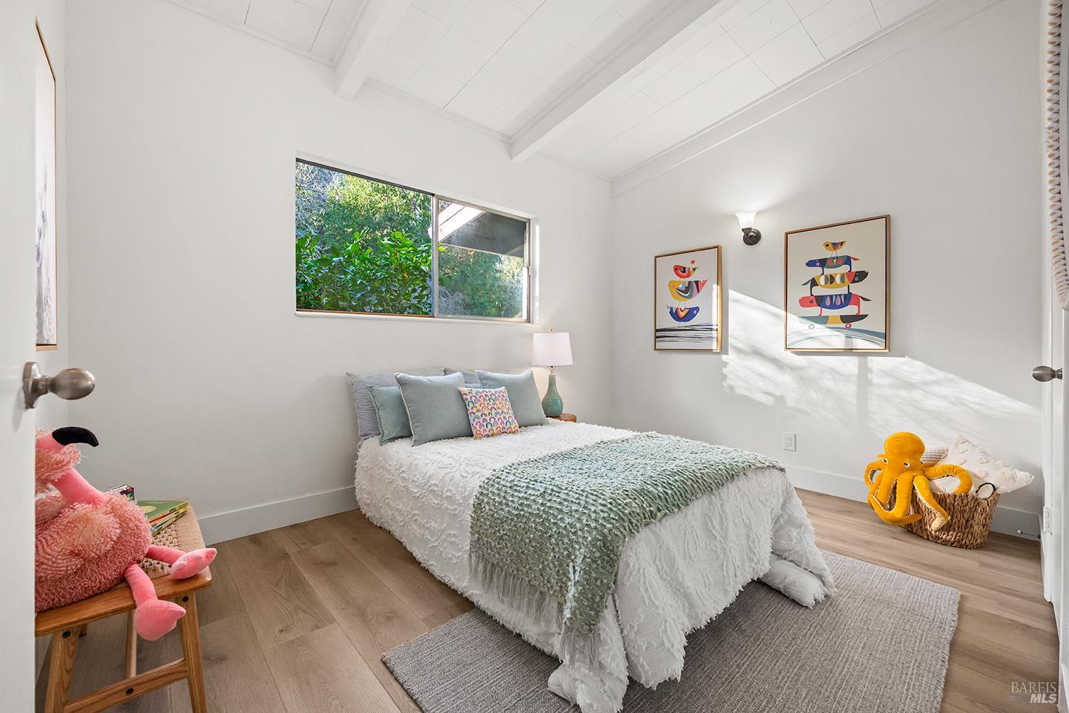 1417 Deer Lane Sebastopol, CA 95472 - Photo 30 of 66 a bedroom with a bed and a window