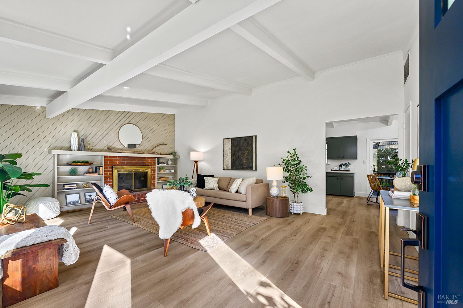 1417 Deer Lane Sebastopol, CA 95472 - Photo 4 of 66 a living room with furniture fireplace and a large window