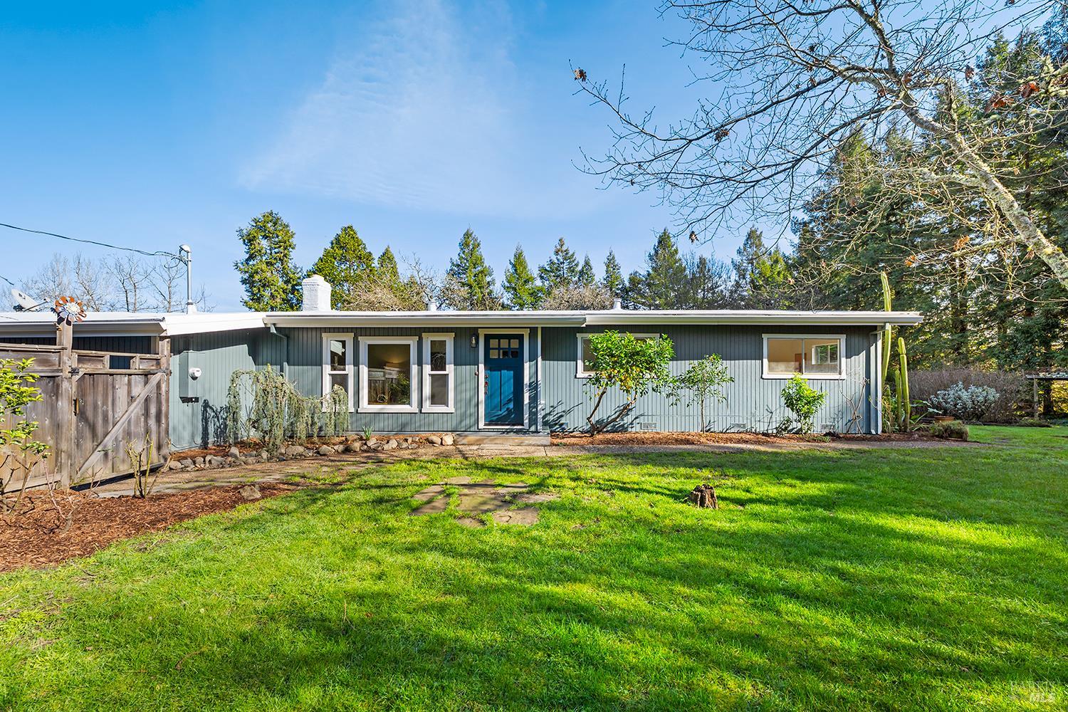 1417 Deer Lane Sebastopol, CA 95472 - Photo 64 of 66 a front view of house with a garden and patio