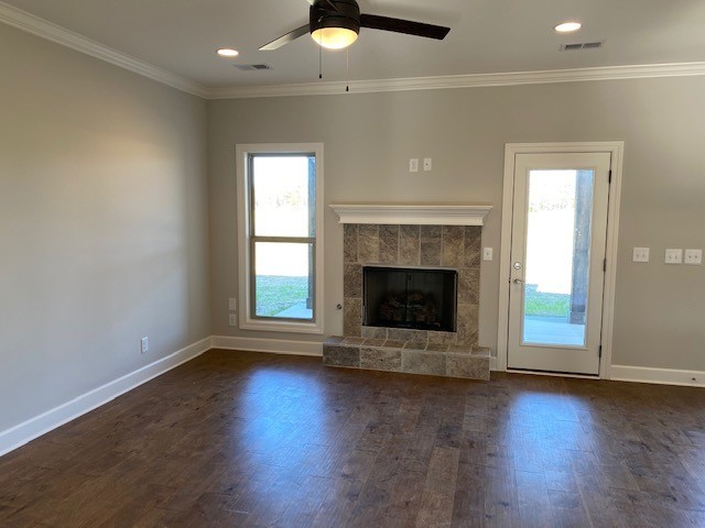 131 Flat Woods Road Lebanon, TN 37090 - Photo 11 of 25 an empty room with wooden floor fireplace and window
