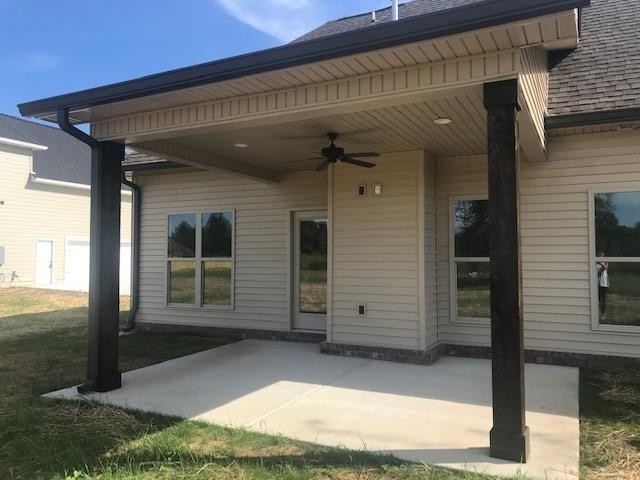 131 Flat Woods Road Lebanon, TN 37090 - Photo 22 of 25 a view of a house with a door and wooden walls