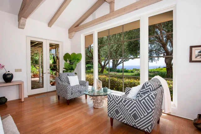 a bathroom with a double vanity sink mirror and shower