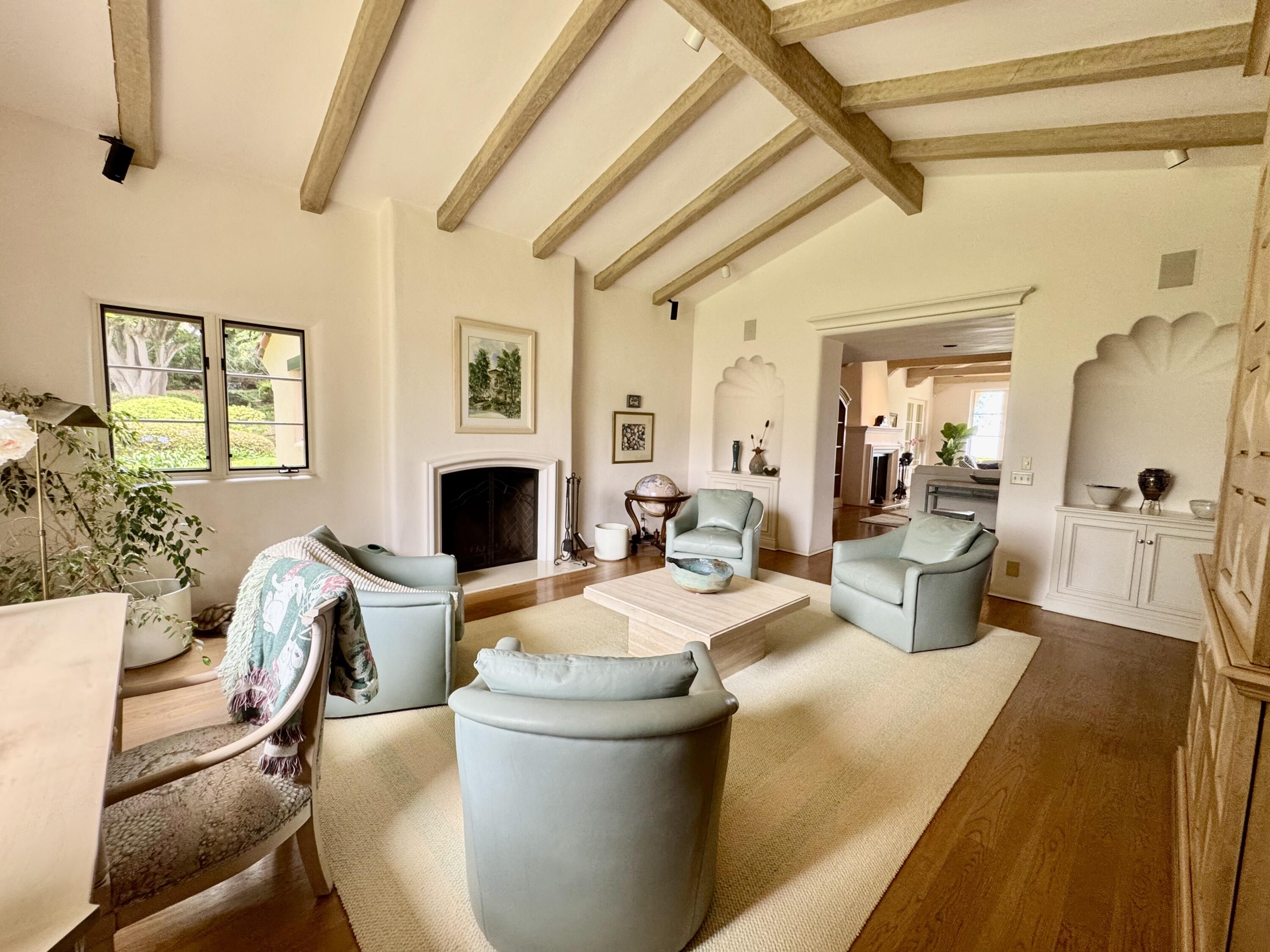 2240 Ortega Ranch Road Summerland, CA 93067 - Photo 18 of 87 a living room with furniture and a fireplace