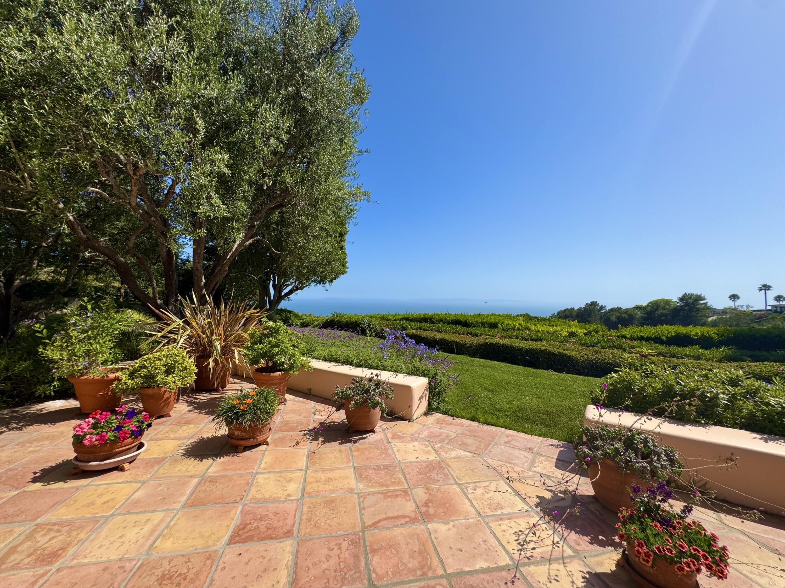 2240 Ortega Ranch Road Summerland, CA 93067 - Photo 68 of 87 a view of a lake with a garden