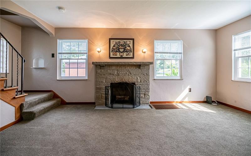 915 Wible Run Road Pittsburgh, PA 15209 - Photo 3 of 25 Stone Fireplace With Sconces In Living Room